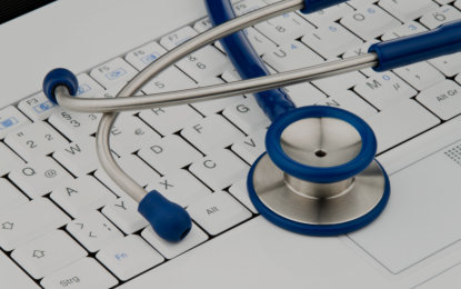 stethoscope on computer keyboard